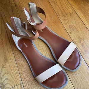 Express tan & brown flats with ankle strap and back zip slight cushion size 10
